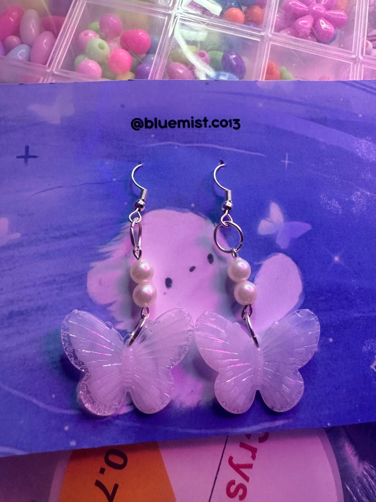 White butterfly earrings